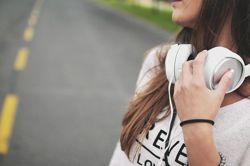 a girl using headphones